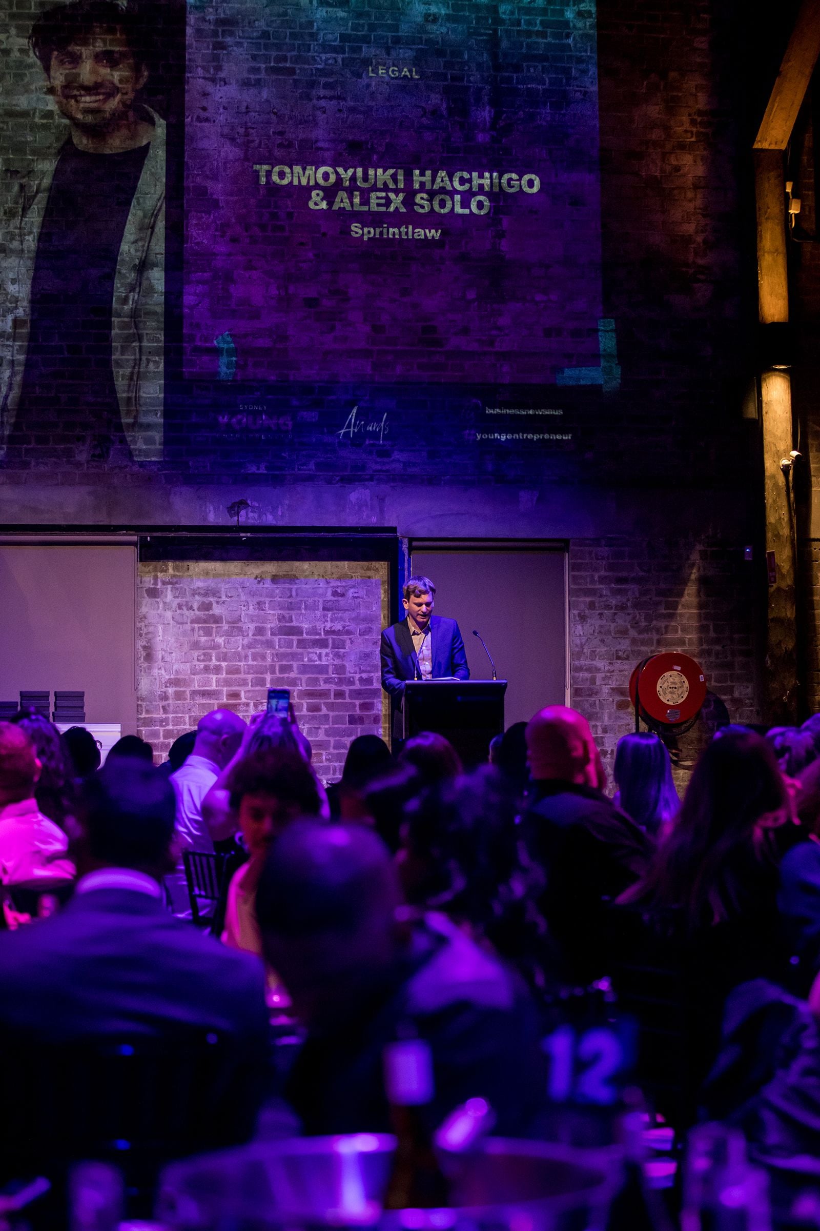 2025 Sydney Young Entrepreneur Awards Gala Dinner Winners accepting trophies on stage at the 2025 Sydney Young Entrepreneur Awards